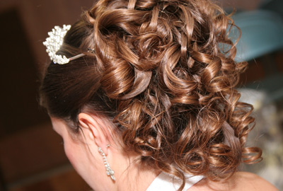 Bride with curly ponytail