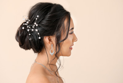 Bride with up do and pearl hair jewellery