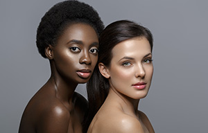 Black model with a white model