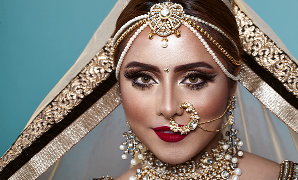Asian bride with jewellery and makeup