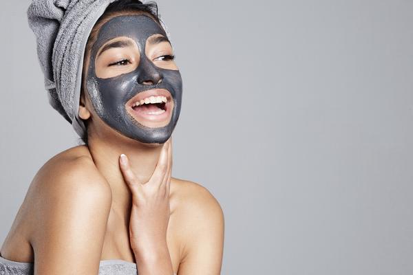 Woman with charcoal facemask