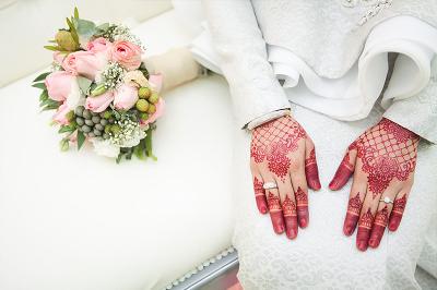 Bride with henna on her hands