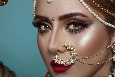 Asian bride with facial jewellery and makeup